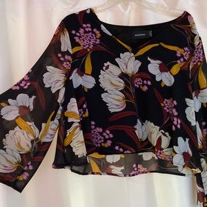 Black floral crop top with bell sleeves